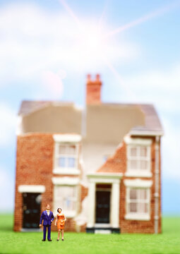 Broken Minature House Figure With People Outside