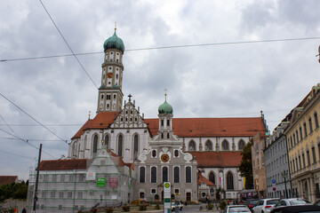 Obraz premium Facade of the St. Ulrich and St. Afra's Abbey in Augsburg, Bavaria, Germany. Long history monastery and Basilica.