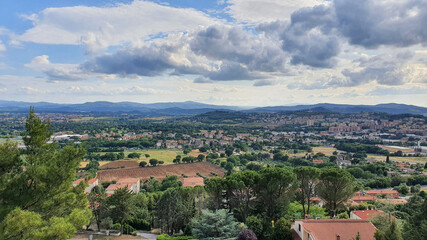 Fototapeta na wymiar View of the valley with San Mariano and Santa Sabina from