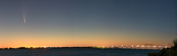 Fototapeta na wymiar C/2020 F3, or Comet Neowise, rising over the coast in the early morning twilight hours. Fire Island Inlet Bridge - Long Island New York
