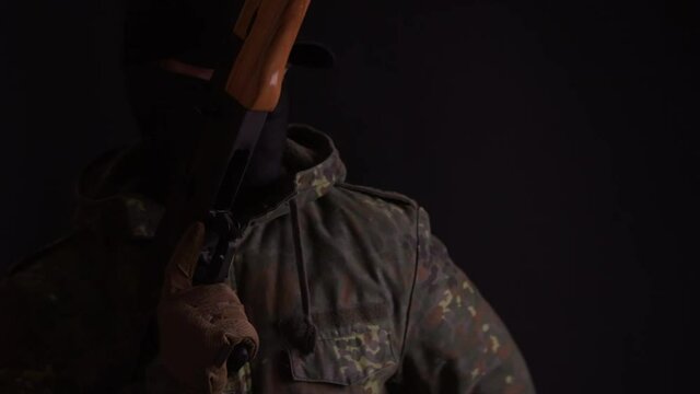 Soldier gives order to troops and reloads his gun