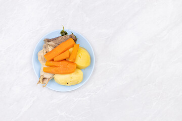 Cooked vegetables carrots potatoes beef meat with copy space