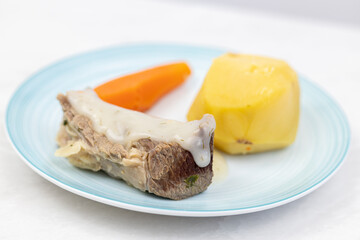 Cooked vegetables carrots potatoes beef meat with copy space