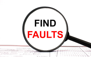 Magnifying glass with text Find Faults on financial tables