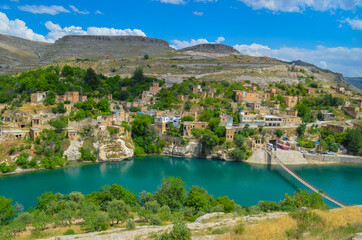 Fototapeta premium Sanliurfa, Halfeti, blue lake and green trees, hidden paradise, old houses 