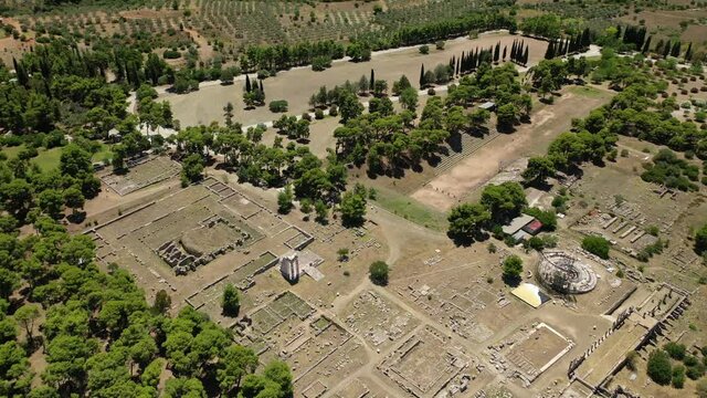 Aerial drone video of archaeological site and stadium of ancient Epidaurus or Epidavros, Argolida, Peloponnese, Greece