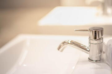 The stainless steal kitchen faucet for use inside the house and the new design for decorate in...