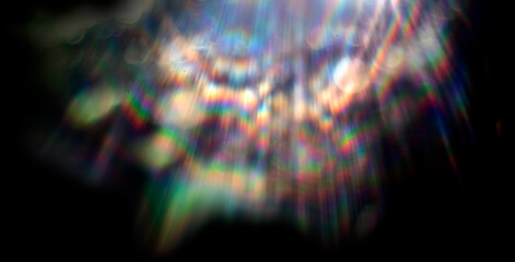 Fototapeta Lens flare effect on black background. Abstract Sun burst, sunflare for screen mode using. Sunflares nature abstract rainbow colourful backdrop, blinking sun burst, lens flare optical rays. obraz