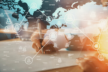 Double exposure of social network theme drawing over people taking notes background. Concept of human connection