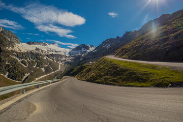 View towards the Solden glacier from the valley during the summer months. Green mountains around Solden glacier.