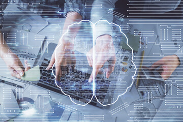 Double exposure of man and woman working together and human brain hologram drawing. Brainstorm concept. Computer background. Top View.