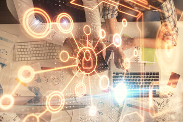 Double exposure of man and woman working together and social network theme hologram drawing. Computer background. connecting concept. Top View.