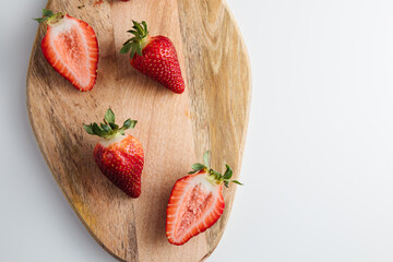 Close-up of a strawberry on a wooden Board. Fresh berries
