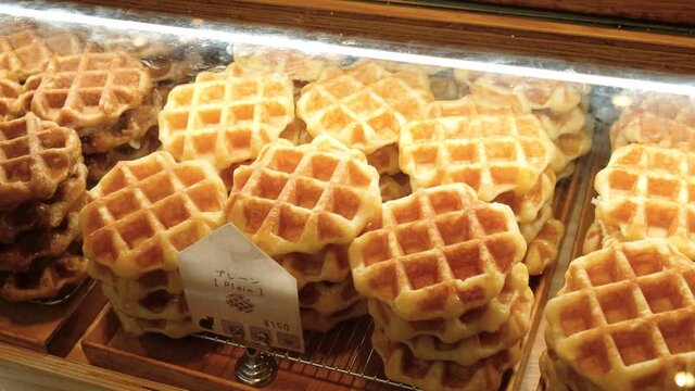 Kyoto, Japan - Aug 25 2019: Japanese Waffles Sold In Street Food Market. Japanese Language Label Means Plain Waffle In English.