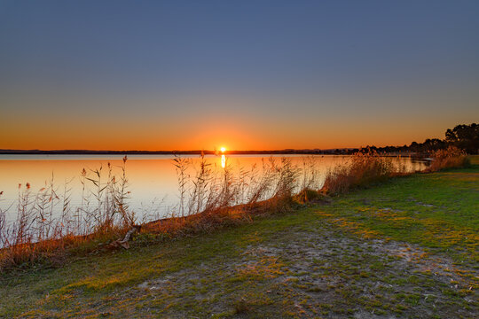 Sunset over the Lake with Clear Skies © Merrillie