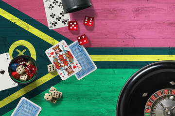 Vanuatu casino theme. Aces in poker game, cards and chips on red table with national wooden flag background. Gambling and betting.
