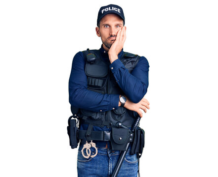 Young handsome man wearing police uniform thinking looking tired and bored with depression problems with crossed arms.