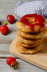 a Homemade Cruller Donuts with strawberry jam