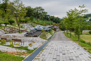 Walkway through public woodland park