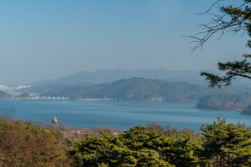 Lake reservoir on hazy overcast day © aminkorea