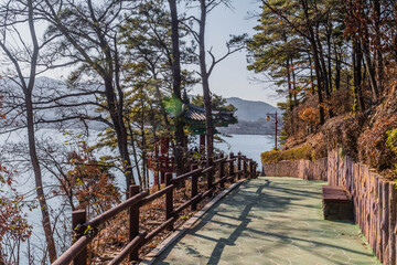 Concrete walkway at lakeside park