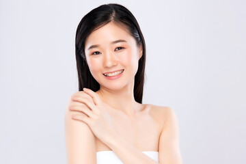 Beautiful smiling woman with clean skin, natural make-up, and white teeth on white background,