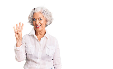 Senior grey-haired woman wearing casual clothes showing and pointing up with fingers number four while smiling confident and happy.