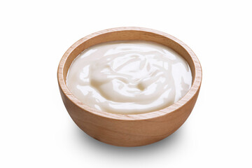 Homemade sour cream yogurt in wooden bowl on white background.