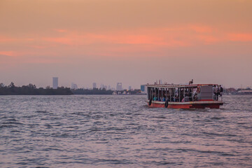 Obraz premium The public ferry service during across Choa Phraya River. Samut Prakan is at the mouth of the Chao Phraya River on the Gulf of Thailand.