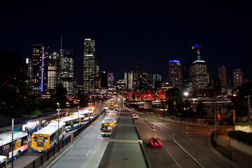 Brisbane Australia at night with traffic and skyline