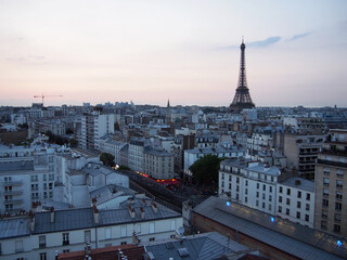 Paris skyline with an impressive Eiffel Tower in the morning sunrise.