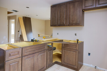 Furniture assembling of custom new kitchen cabinets