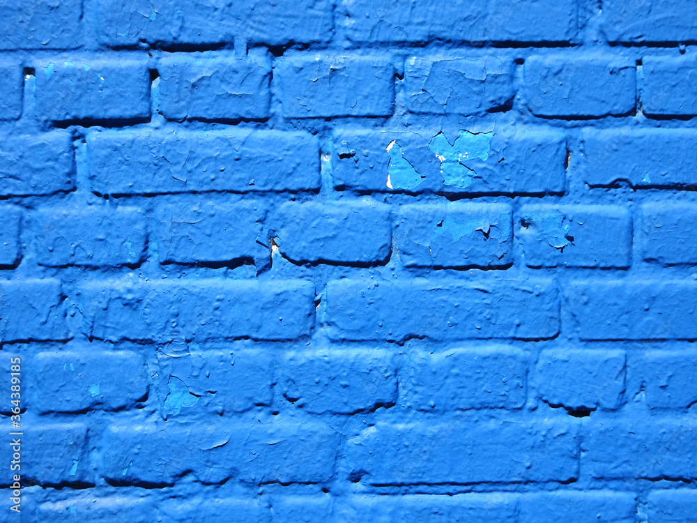 Wall mural old brick wall painted with blue color