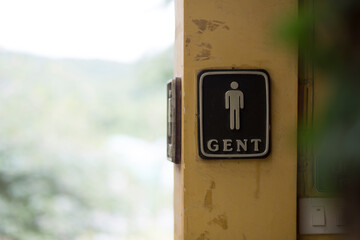 Men or Gentlemen toilet sign icon information in restaurant