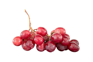 Many red grapes were placed on a white background.