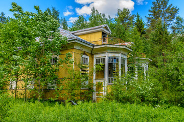 Abandoned and collapsing forester's house in the Leningrad region.