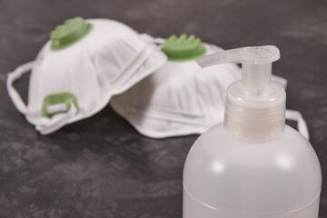 Alcohol disinfectant and protective mask N95. Coronavirus protection measures. Novel coronavirus outbreak. 2019-nCoV