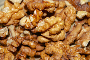 Peeled walnuts close-up. Surface texture. Healthy diet.