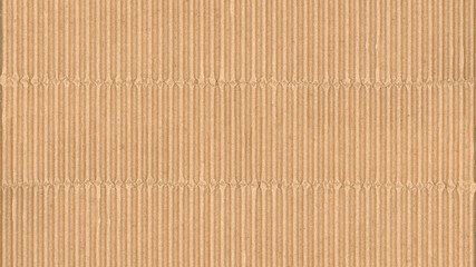 Corrugated cardboard texture. Blank empty cardboard with ridges and folded creases. Recycled material background.