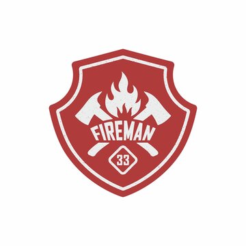 Color illustration of a red shield, text, crossed axes, fire on a white background. Vector illustration of a firefighter logo in vintage style with grunge texture.