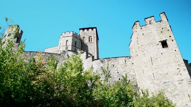 View of ancient medieval castle Valere Basilica in Swiss Alps