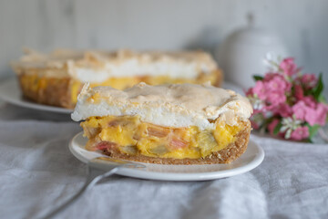 Home made rhubarb meringue cake on a plate