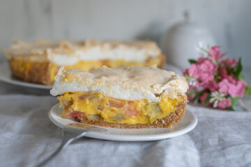 Home made rhubarb meringue cake on a plate