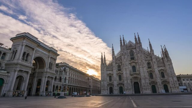 Milan Italy time lapse 4K, city skyline sunrise timelapse at Milano Duomo Cathedral