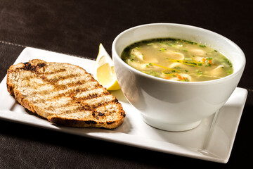 bowl of soup with bread