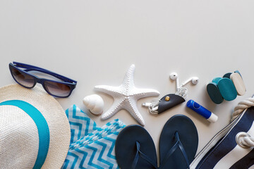 Blue summer theme background with ladies' and beach accessories