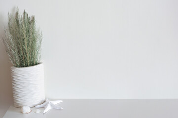 Wall mockup with beach/ocean theme decoration. Copy space.