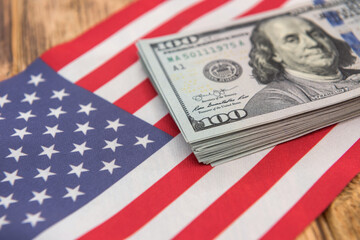 finance concept dollar bills lying on flag of america