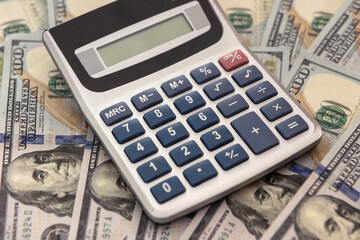 save money calculator and dollar bills