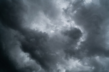 Dark clouds moving in the sky before rain. There are many different types of rain clouds. The three most common types are stratus, cirrus, and cumulus.